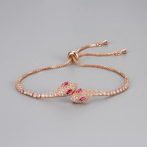 Detail of rose gold snake bracelet with white crystals and adjustable sliding clasp