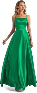 Detail of elegant emerald green satin evening dress with side slit and adjustable straps