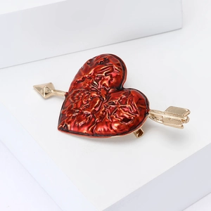 Exquisite gold arrow through red enamel heart brooch for elegant women suits and sweaters