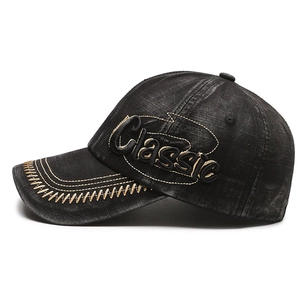 Retro washed black denim baseball cap with gold Classic embroidery and stitching detail