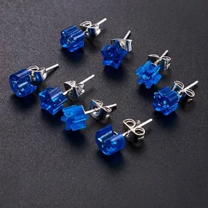 Blue resin moon and star stud earrings made with silicone DIY jewelry molds
