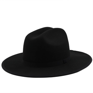 Detail of wide brim black wool felt fedora with teardrop crown and grosgrain band