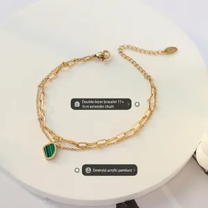 Double-layer gold chain bracelet with emerald acrylic pendant and geometric malachite texture
