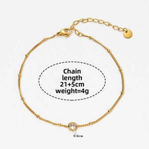 Detail of gold beaded satellite chain anklet with sparkling 0.6cm round zircon charm