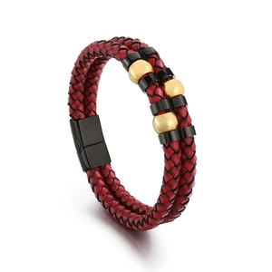 Double-layered red and black braided leather bracelet with gold beads and magnetic clasp
