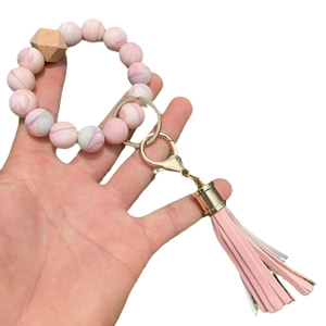 Silicone beaded wristlet keychain with marble print beads and pink leather tassel