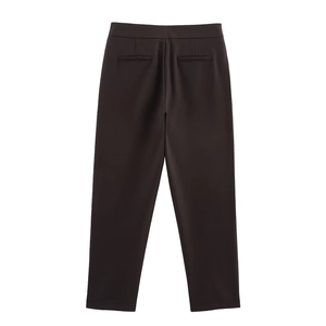 Rear view detail of high-waist women's suit trousers with double welt back pockets