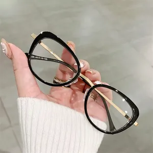 Retro cat eye glasses frame with black glossy rims and gold metal temples for women