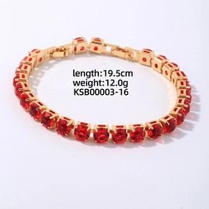 Detailed view of golden tennis bracelet with red zircons, length 19.5cm and weight 12.0g
