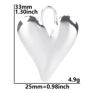 Detailed view of silver heart pendant with dimensions 33mm by 25mm and weight 4.9g