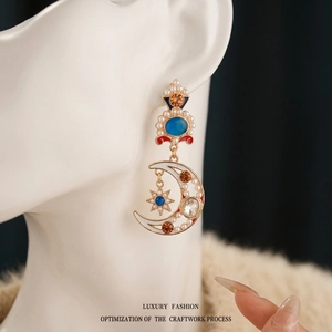 Vintage gold crescent moon earrings with blue stars and pearls for women