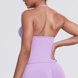Detail view of the back design on this high-impact lavender sports bra and yoga leggings set