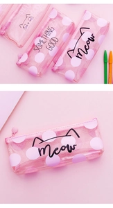 Detail of pink transparent PVC pencil case with glitter, white dots and cat ears