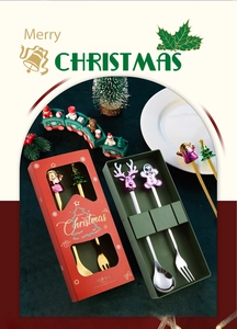 Close-up of Christmas cutlery gift sets with stainless steel Santa and tree handles