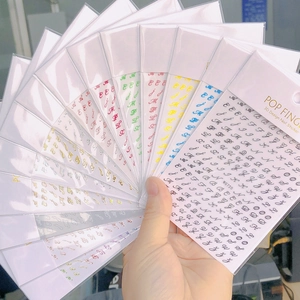 Colorful 3D alphabet nail stickers set featuring diverse fonts and vibrant letter designs