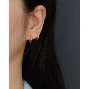 Minimalist S925 silver U-shaped gold hoop earrings with multi-color stones worn on ear