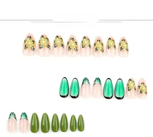 Macro detail of almond press-on nails featuring tropical 3D floral and leopard patterns