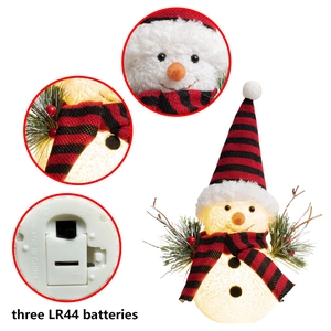 Lighted plush snowman ornament with red and black striped scarf and hat for Christmas decor
