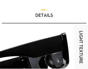 Close-up of wide temple joints on glossy black fashion sunglasses with light texture