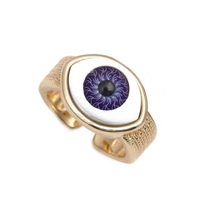 Adjustable golden evil eye ring featuring a purple pupil with colorful zircon accents