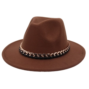 Detailed view of dark brown fedora hat with gold and black braided chain strap trim