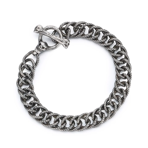 Bracelet chaîne cubaine en acier titane avec breloques crâne et fermoir à bascule OT