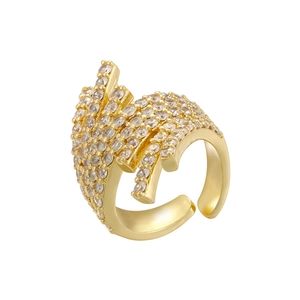 Macro shot of gold adjustable ring with pavé-set round white cubic zirconia stones