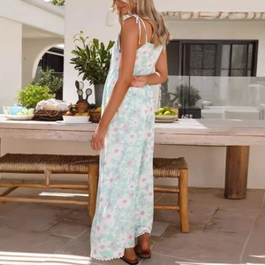 Elegant mint green floral jumpsuit for women with spaghetti straps and summer pattern