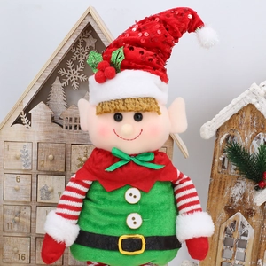 Detailed close-up of a festive Christmas elf plush with sequined hat and striped outfit