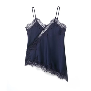 Detail of dark blue satin camisole with eyelash lace trim and asymmetric hem design