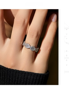 Macro detail of a 925 sterling silver ring with marquise-shaped diamond settings