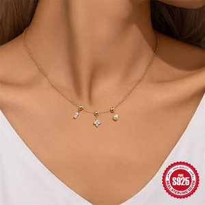 Elegant S925 sterling silver necklace with zircon flower and pearl pendant on a model