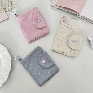 Star pattern fabric coin purses in pink and blue with heart snaps and ring hooks