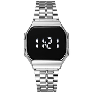 Close-up of a vintage silver digital watch with stainless steel strap and black octagonal face