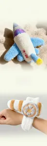 Macro detail of J-20 jet plush toy wristband featuring soft blue and white fabric