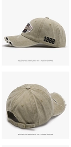 Detail of vintage washed khaki baseball cap featuring 1968 embroidery and metal buckle