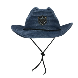 Detail of navy blue straw cowboy hat featuring a bull head emblem and adjustable chin strap