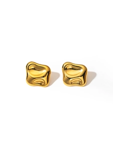 Detailed close-up of golden irregular lava-style square earrings with polished finish
