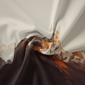 Detailed close-up showing soft fabric texture of a bohemian mountain print wall tapestry