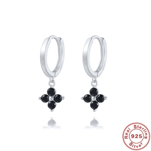 Detailed view of S925 sterling silver four-leaf clover earrings with black stone inlay