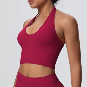 Detail of burgundy ribbed seamless yoga top with a stylish halter neck design