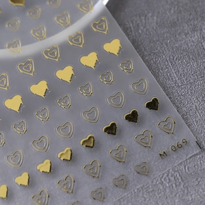 Golden heart pattern adhesive nail stickers M-069 with premium bronzing metallic finish