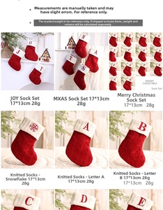 Close-up of knit Christmas stockings with white letters and snowflake patterns