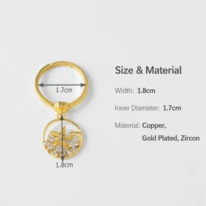 Detailed size specifications for a gold sea star ring with cubic zirconia accents