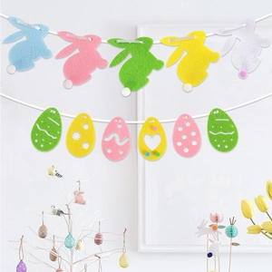 Detail of Easter felt banners featuring colorful bunnies and patterned egg shapes