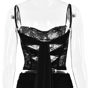 Detail view of black lace camisole top with intricate criss-cross lace-up back design