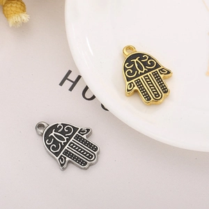 Vintage Hamsa Hand pendants in gold and silver finish with evil eye detailing