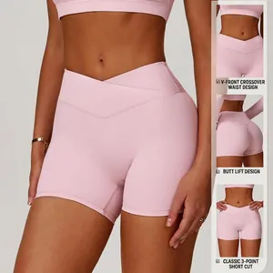Rosa High-Waist Yoga-Shorts mit Crossover-Bund und pfirsichfarbenem Push-up-Design