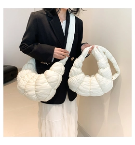 Detailed comparison of white pleated dumpling bags in small and large sizes