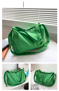 Detailed views of a green nylon gym bag with double black zippers and wide shoulder strap
